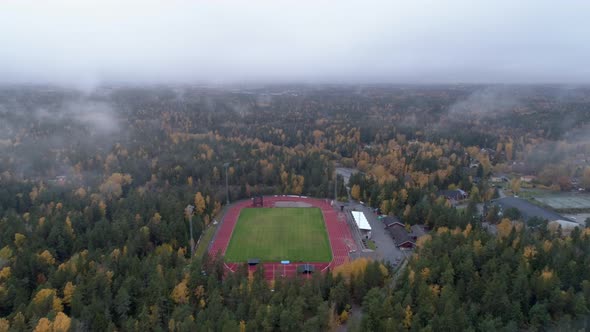 Aerial View of Soccer Field in Forest