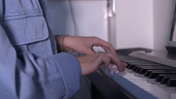 Young Girl Is Playing Piano 2