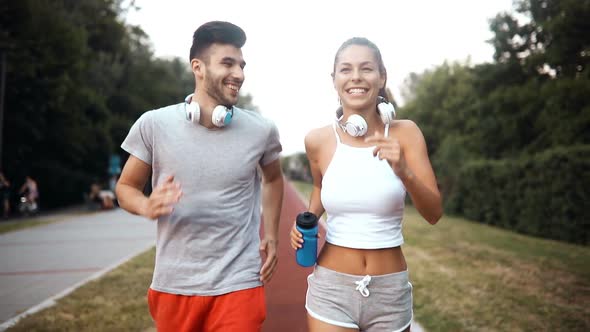 Beautiful Couple Jogging and Fitness Training Outdoor alt