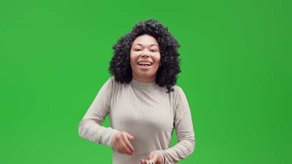 Green Screen Young African Female Holding Bags with Present