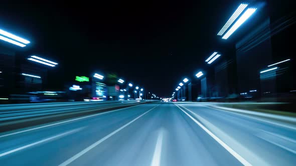 Motion Timelapse of The Night Rush Drive In A Big City. alt