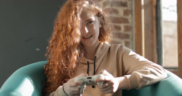 Girl Gamer Playing Video Game alt