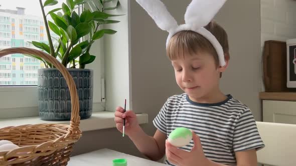 Cute Little Boy Colouring Eggs for Easter