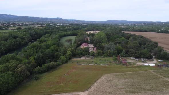 Forests Tiny Lake and Farm Fields in the Mountains in South of France Landscape alt