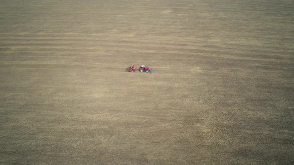 tractor in French Vexin Regional Natural Park seen from the sky alt
