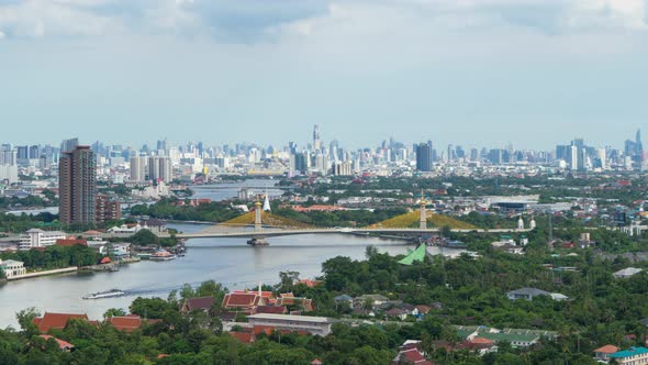 Time lapse of aerial view of Maha Chesadabodindranusorn Bridge or Nonthaburi Bridge crossing alt