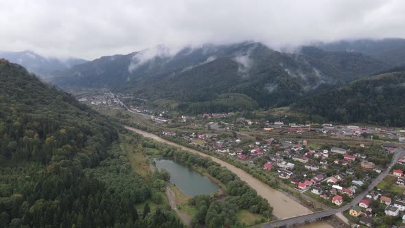 Aerial View of the Village in the Carpathian Mountains in Autumn. Ukraine alt