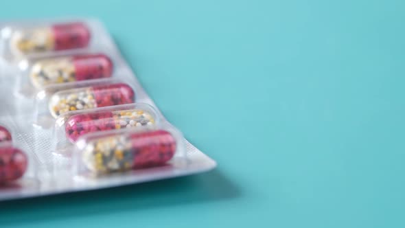 Close Up of Capsule f Blister Pack on Table alt