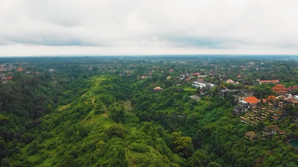 Beautiful cinematic Ubud, Bali drone footage with exotic rice terrace, small farms, village houses a alt
