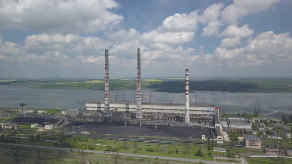 Thermal Power Plant on the Background of an Artificial Reservoir, Video From the Drone, Electricity