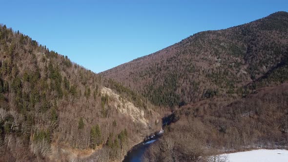 View of the beautiful snow-capped mountains on a winter day. Drone camera. alt