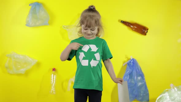 Girl Activist Holding Painted Picture of Earth. Plastic Trash Nature Pollution. Save Ecology alt