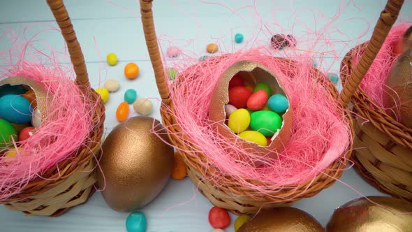 Easter Egg with Colorful Candies in a Basket Close Up