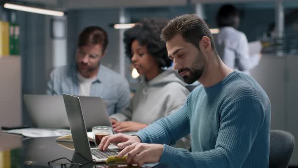 Creative Manager Receive Bad News on Email Working in Open Space Office alt