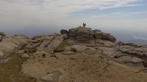 Hikers looking at view on Mount Champaqui, Cordoba Province, Argentina alt