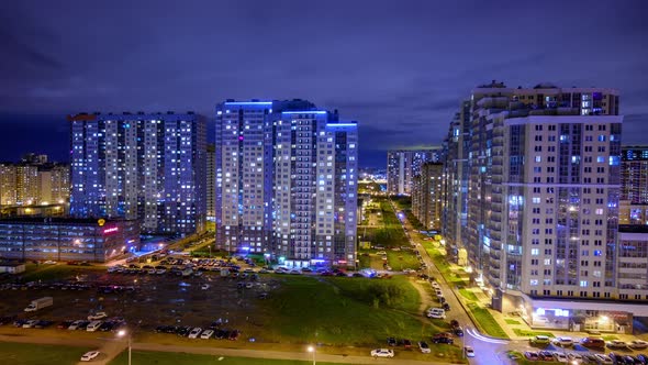Night window timelapse. architecture of the night city, urbanistic view of the building alt