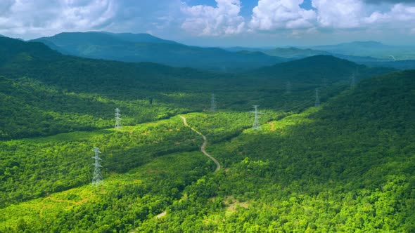 Mountain there is a large line of power transmission towers,
