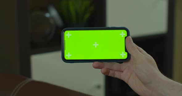 Mock-up for Tracking or Watching Content Close-up. Modern Life of Caucasian Man Indoors House. Web