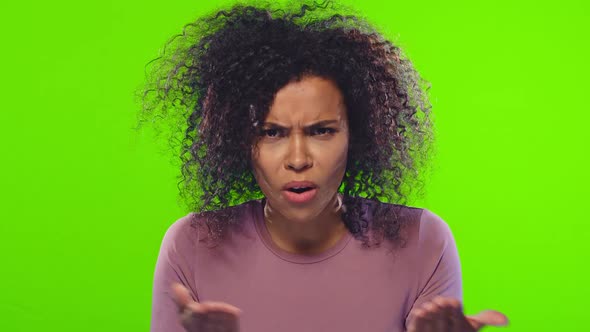 Angry Young Dark Skinned Woman Screaming Loudly Opening Her Mouth alt