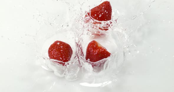 Strawberries, fragaria vesca, Falling on Water, Slow Motion 4K
