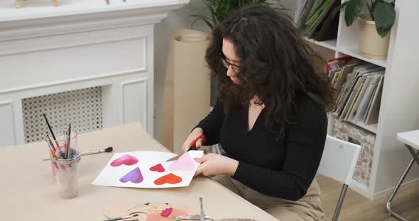 Creative Girl is Crafting Handmade Cards with Hearts for Valentine's Day