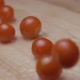 Cherry tomoatoes falling with water slow motion HD 