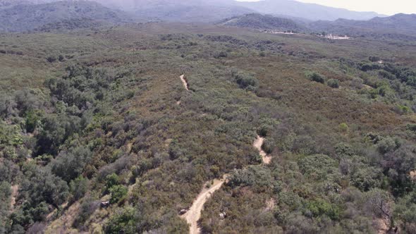 Aerial Drone Shot of a Dirt Trail in the California Wilderness (Cachuma Lake, California)