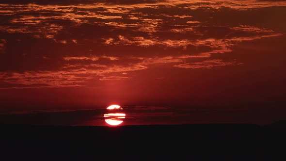 Close Up Red Sunrise with Clouds Time Lapse alt