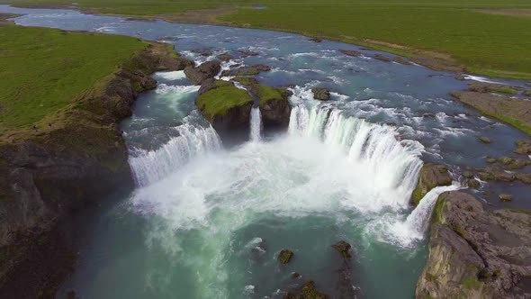 Drone Aerial Footage of the Godafoss Waterfall in North Iceland alt
