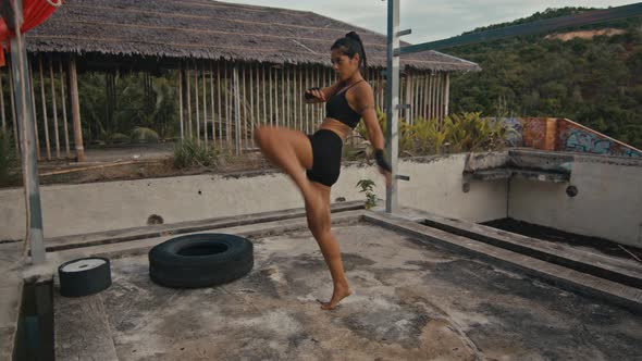 Woman Fighter Trains Her Punches Training Day in the Abandoned Hotel Strength Fit Body alt