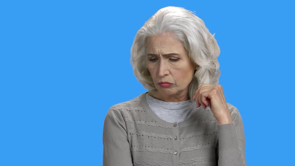 Sad Thoghtful Senior Retired Lady alt