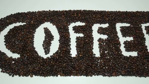 Word From Coffee Beans On The Table