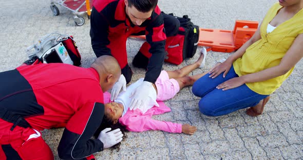 Mother cries for her injured daughter on street alt