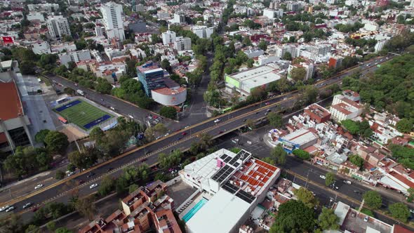 Aerial Over avenue Rio Churubusco With Traffic Going Past Over  Av. División del Nte In Coyoacan, Me alt