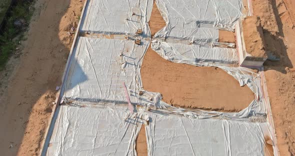 Laying Installation of a New PVC Plastic Pipe of the Earth for Pipe  Sewer alt