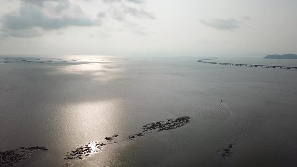 Aerial view fishing boat Penang second Bridge. alt