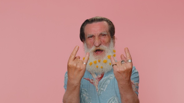 Overjoyed Happy Man Showing Rock n Roll Gesture By Hands Cool Sign Shouting Yeah with Crazy Face alt