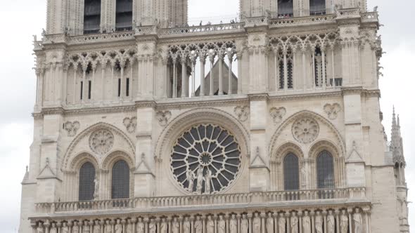 World wide recognizable Notre-Dame Cathedral located in France capital Paris  4K 2160p UltraHD tilt 