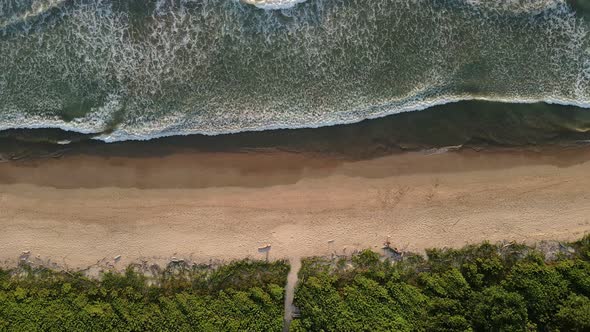 Still aerial footage in 4k of playa Ventanas. Divine empty beach during sunset in Costa Rica. Small alt