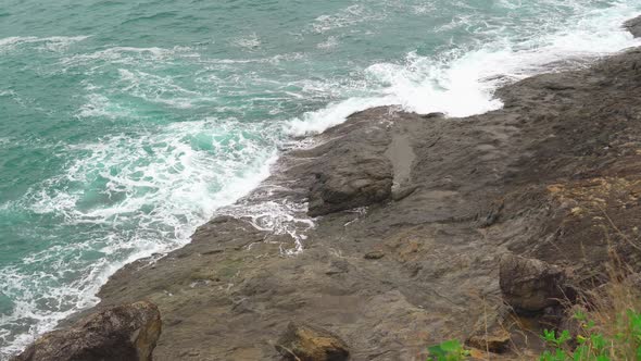 Waves of The Sea with Turquoise Water. the Waves Break on The Rocky Shore alt