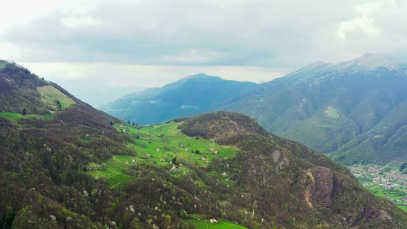 Aerial Video of the Small Town of Pasturo in Lombardy North Italy Showing Mountain Panorama Forest alt