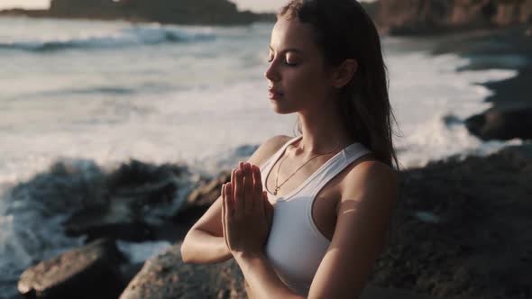 Portrait of Beautiful Girl Meditates and Concentrated on Breathing Slow Motion alt