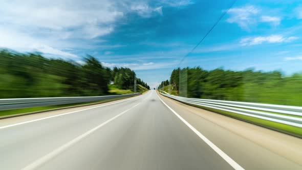 4K Point of View Hyperlapse Time-lapse of Car Driving Trees Stretch on Both Sides Dashcam POV alt