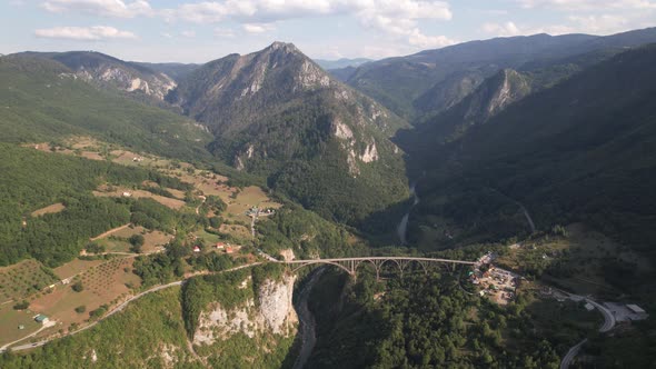 Aerial view of Tara river canyon, mountains and bridge, Montenegro, Europe alt