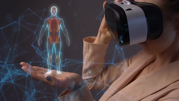 Young Woman Using A Virtual Reality Headset alt