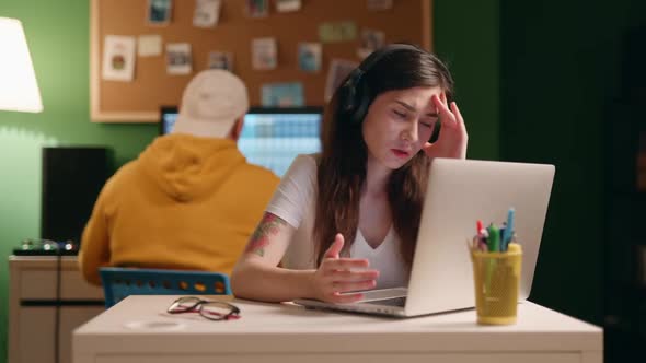 Stressed Businesswoman Working Late at Night in the Office, While Her Colleague Left Home. Exhausted alt