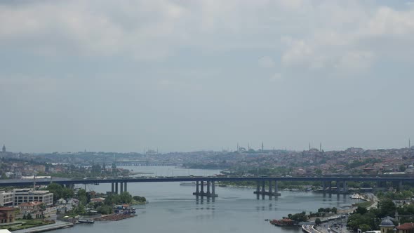 Panoramic View of Turkish City with Bridge Crossing Bay alt