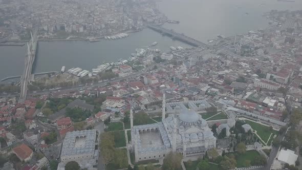 Aerial footage of Suleymaniye Mosque from a foggy day alt