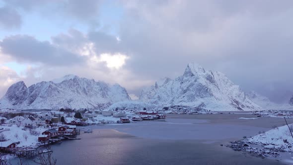 Norwegian village on the shore of a winter fjord