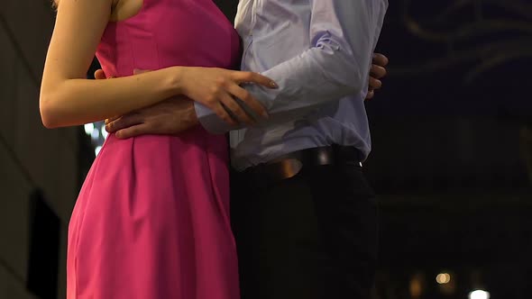 Man in Love Hugging Young Female by Waist Passionate Date Relationship alt